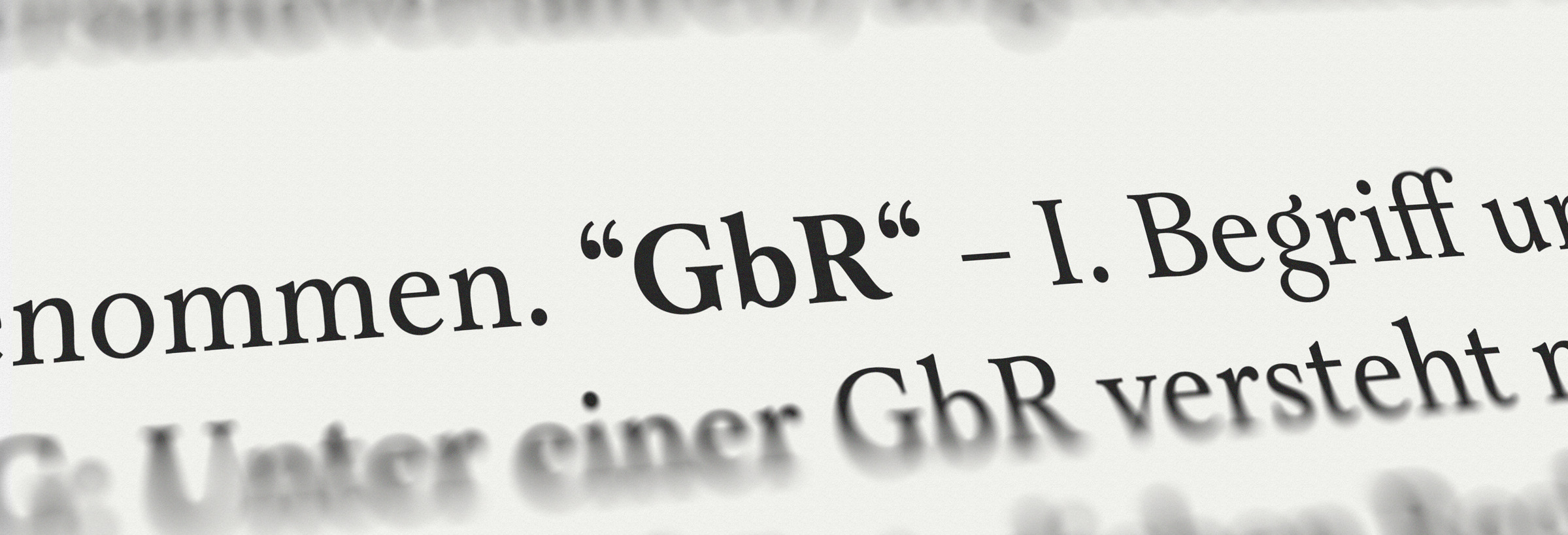 Das Bild zeigt den Schriftzug GbR in einem Buch.